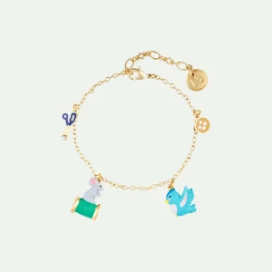 Bracelet fin bouton, oiseau, bobine de fil et souris, ciseau